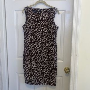 97% polyester for 3% spandex. Size 8 brown and white